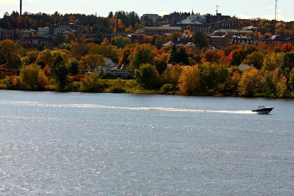 UNB campus on the hill above the Saint John River in fall colours